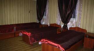 Гостиница Клуб Отель Фора Курган Односпальная кровать в общем номере-1